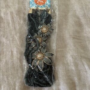 Elegant Black Beaded Necklace with Gold Floral Accents